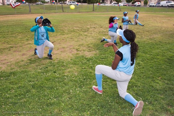 Girls playing softball